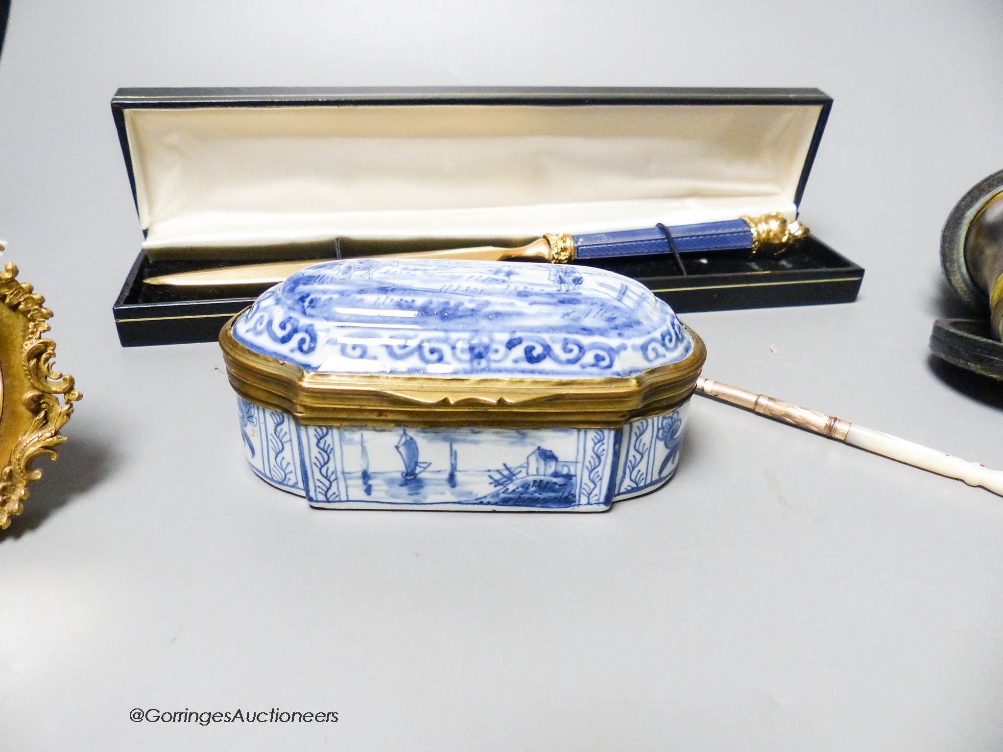 A Delft box, miniature binoculars, a mother of pearl pen and a letter opener, etc.